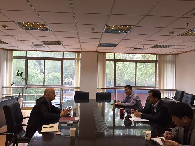 Meeting with Mr. Pan Dongbiao, Deputy Director of Nanjing Education Bureau